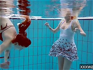steamy Russian damsels swimming in the pool