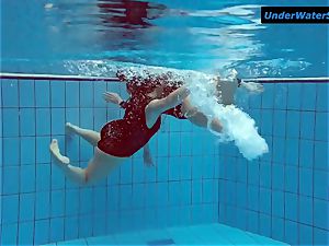 two scorching teenagers underwater