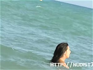 uber-sexy nudist gals are gripped on camera on a beach